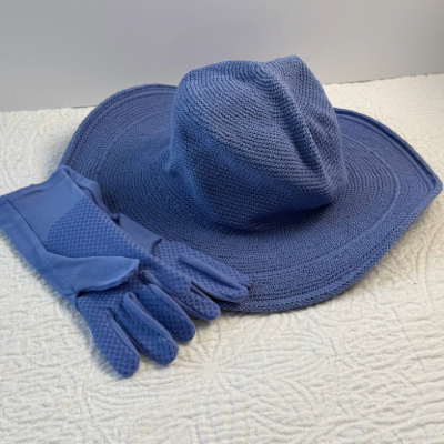 the higarden mothers day set of wide brim sun hat with pair of luxurious gardening gloves in the same blue periwinkle baby blue color.