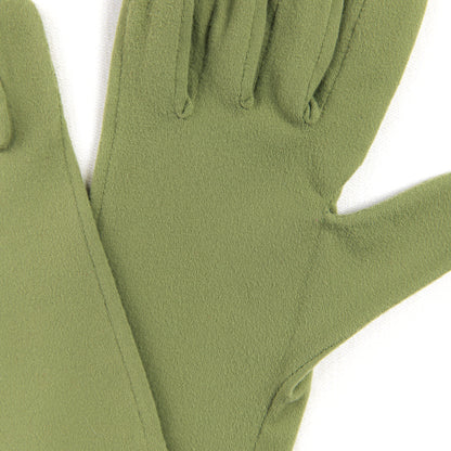 Pair of green gloves on a white background
