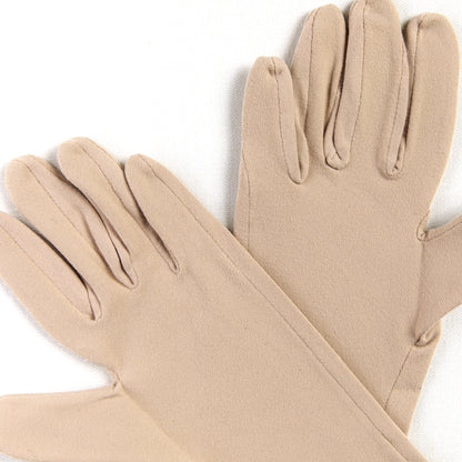 Pair of beige gloves on a white background