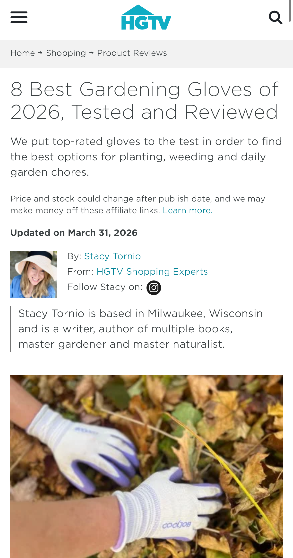 A screenshot of a HGTV online article titled '8 Best Gardening Gloves of 2026, Tested and Reviewed,' with a small product photo at the bottom showing a hand wearing a white gardening glove while pulling weeds among fallen leaves.