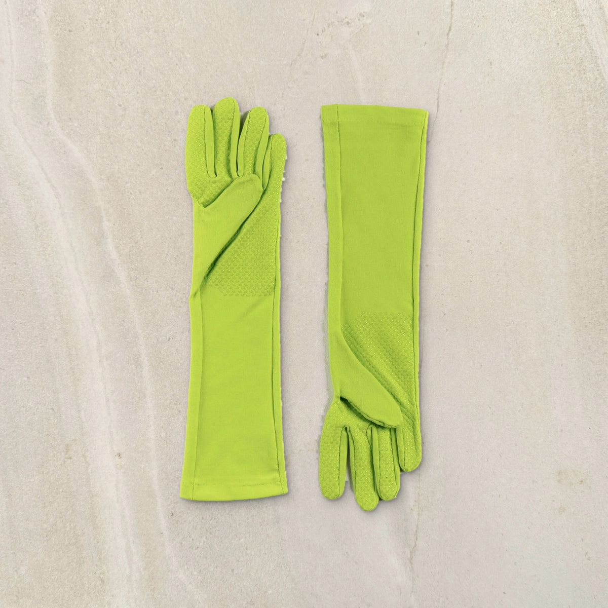 higarden high rise gardening gloves in grass green with grip palm, flat lay on limestone