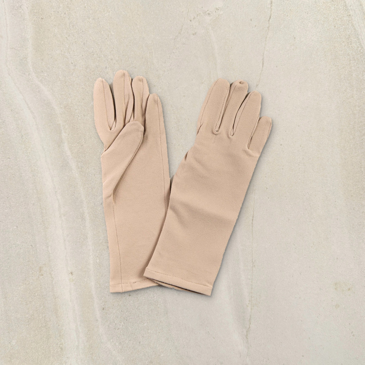 higarden mid rise gardening gloves in pinenut with smooth palms, flat lay on limestone