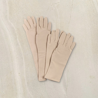 higarden high rise and mid rise gardening gloves in pinenut side by side on limestone